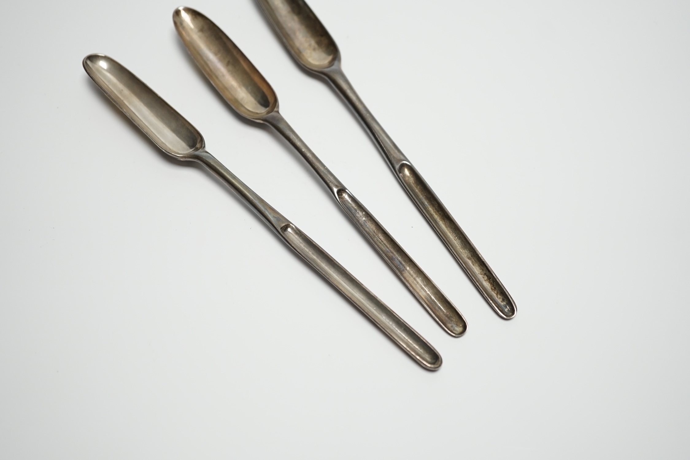 Three George II silver marrow scoops, Richard Pargeter, London, 1733, 20.7cm, Ann Hill, London, 1734 and Ebeneezer Coker?, London, 1755.
